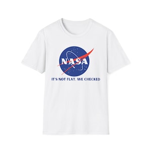 May include: White t-shirt with a blue and red NASA logo and the text "It's not flat. We checked."