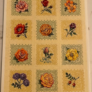 May include: A sheet of stickers with illustrations of roses in red, orange, yellow, and purple. Each rose is set within a square frame with a decorative green border on a cream background. The text "© 1994 HALLMARK CARDS, INC" is visible.