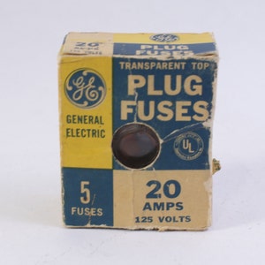 May include: A box of 5 General Electric 20 amp plug fuses. The box is yellow and blue with the General Electric logo and the text "Plug Fuses" and "Transparent Top". The box also has a UL label.