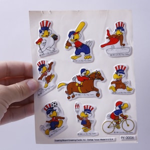 Puffy Sam the Olympic Eagle, Mascota, 1984, Juegos Olímpicos de Verano, Los Ángeles, Deportes, 3D, Relieve, Hoja de pegatinas, Fabricación de tarjetas, Vintage, ~ M-03-03