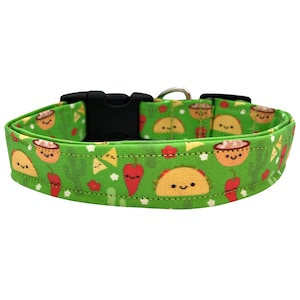 Green dog collar featuring a playful pattern of smiling tacos, chips and salsa, and saguaro cacti, designed with vibrant colors and a fun, food-themed vibe.