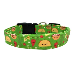 Green dog collar featuring a playful pattern of smiling tacos, chips and salsa, and saguaro cacti, designed with vibrant colors and a fun, food-themed vibe.