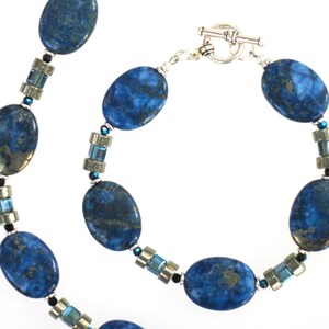 Lapis and Pyrite Bracelet with Glass Crystal and Rhodium plated beads and a Silver Plated Toggle Clasp