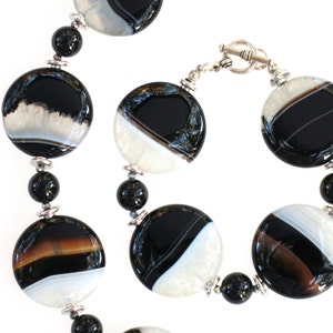 Black Line Agate, Black Onyx and Hematite Bracelet with Rhodium plated beads and a Silver plated Toggle Clasp
