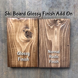 May include: Two wood samples showing the difference between a glossy and a normal rustic finish. The sample on the left has a glossy finish and the sample on the right has a normal rustic finish.  "Ski Board Glossy Finish Add On" is written at the top of the image.