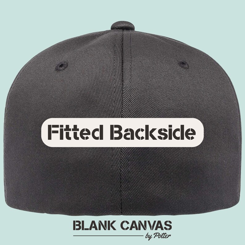 May include: A dark grey baseball cap with a curved peak. The back of the cap features the text "Fitted Backside" in a white, rectangular box. Below, the text "BLANK CANVAS" and "by Potter" are printed in black.
