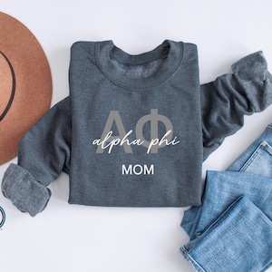 "Offizielles ""ALPHA PHI"" Sweatshirt."