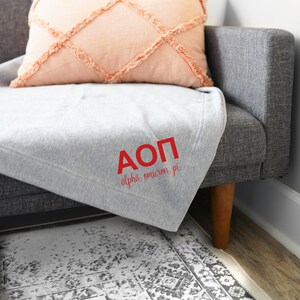 Manta oficial de la hermandad ALPHA OMICRON PI