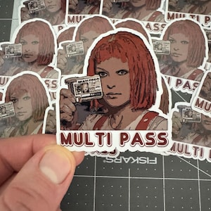 May include: A set of stickers featuring a woman with red hair holding a multi-pass card. The stickers are white with red and black text that reads "MULTI PASS".