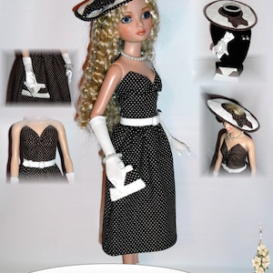 Può includere: Un cartamodello PDF per un abito da bambola da 40,6 cm in stile vintage anni '50. L'abito comprende un vestito a pois neri e bianchi, una cintura bianca, guanti bianchi, una borsa bianca e un cappello bianco con un fiocco nero. Il cartamodello include anche istruzioni per la creazione di gioielli.