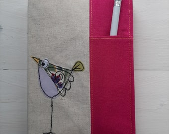 Quirky bird applique notebook cover.