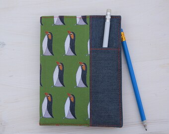 Penguin print covered notebook.