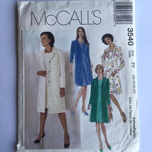 May include: A sewing pattern for a long coat with a button-up front. The pattern is for sizes 16-18-20-22. The pattern is called McCall's 3540.