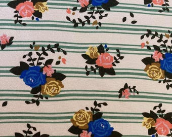 Organic Cotton Knit Fabric. Roses Organic Cotton Knit. Stretchy Knit Fabric. Children's Clothing Fabric. Pajama Fabric. Baby Fabric.