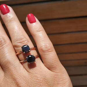 Black diamond solitaire engagement ring