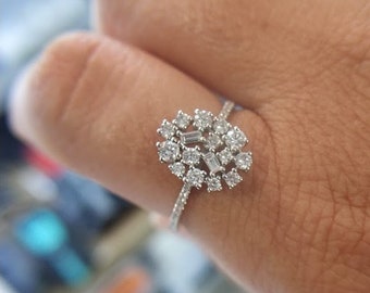 Oval cluster diamond ring
