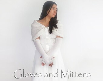 May include: White knitted gloves and a matching shawl with a satin ribbon. The gloves have a delicate lace trim.