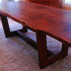 Custom Live Edge Dining Table. Live edge slab dining tables custom made for you! Raw edge table from black walnut slabs.