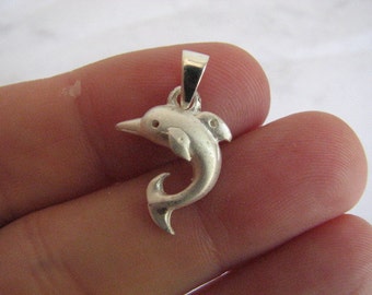12 Dolphin charms tibetan silver FF81