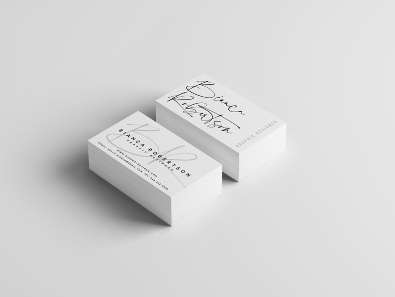 May include: A stack of white business cards with the name Bianca Robertson and the title Graphic Designer printed in black ink.