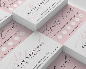May include: A stack of pink and white loyalty cards with the text "Loyalty Card" and "Blush Boutique Miami, Florida" printed on them. The cards have a punch card design with the text "Buy 5 Treatments, Get the 6th 50% Off".