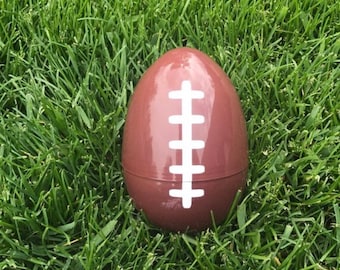 Balón de fútbol para revelar el género: relleno de polvo rosa o azul