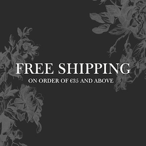 May include: Dark gray background with white text that reads "FREE SHIPPING" and "ON ORDER OF &euro;35 AND ABOVE." Floral illustrations in white are in the corners of the image.