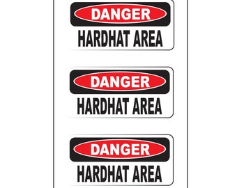 May include: Three black and white warning signs with red text. Each sign reads "DANGER HARDHAT AREA".