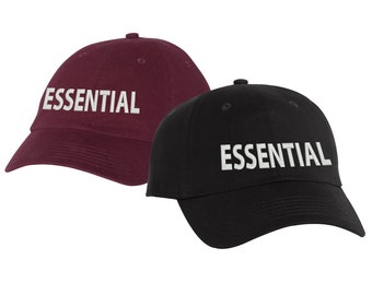 May include: Two baseball caps, one burgundy and one black, both with the word "ESSENTIAL" embroidered in white on the front.
