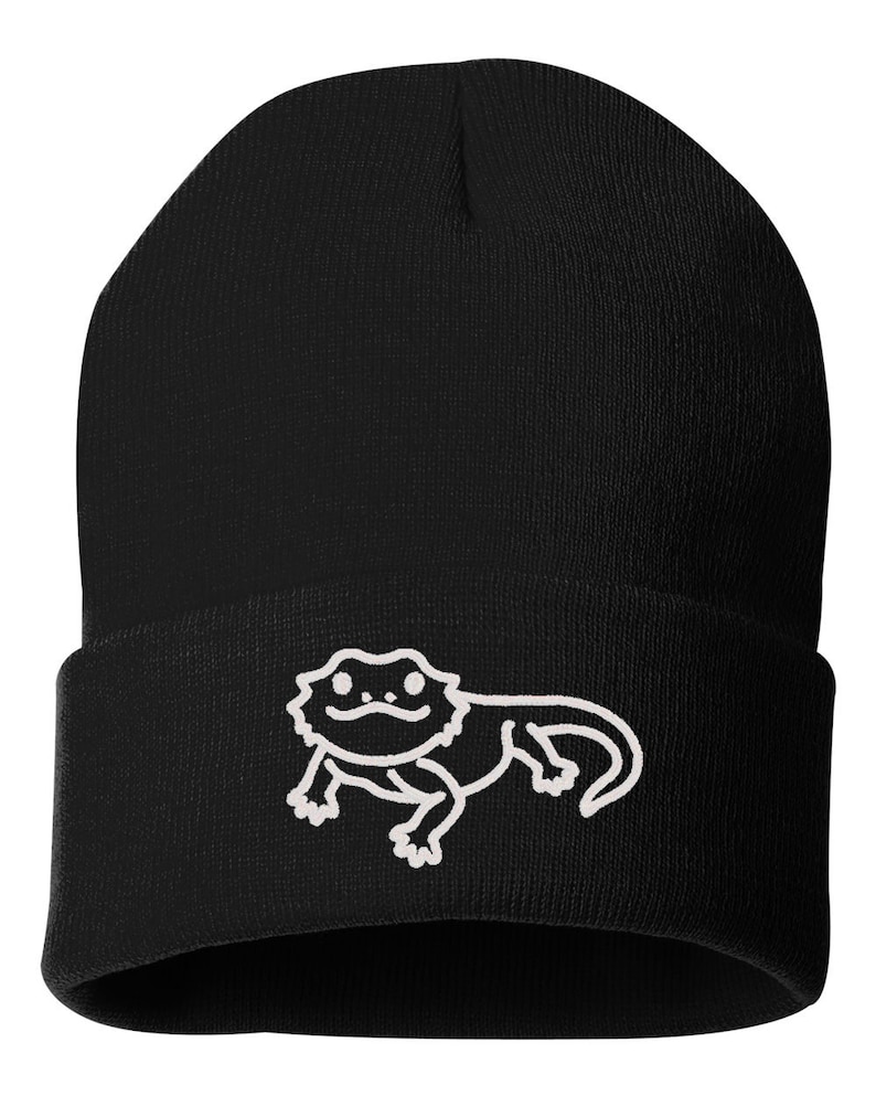 May include: Black beanie with a white outline of a bearded dragon on the front.