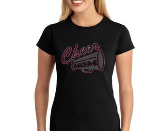 May include: Black t-shirt with a maroon rhinestone design of a megaphone with the word "Cheer" above it.