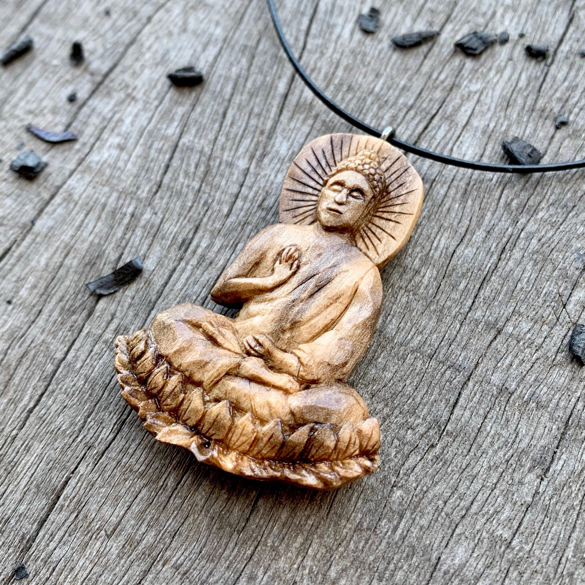 Carved buddha best sale pendant