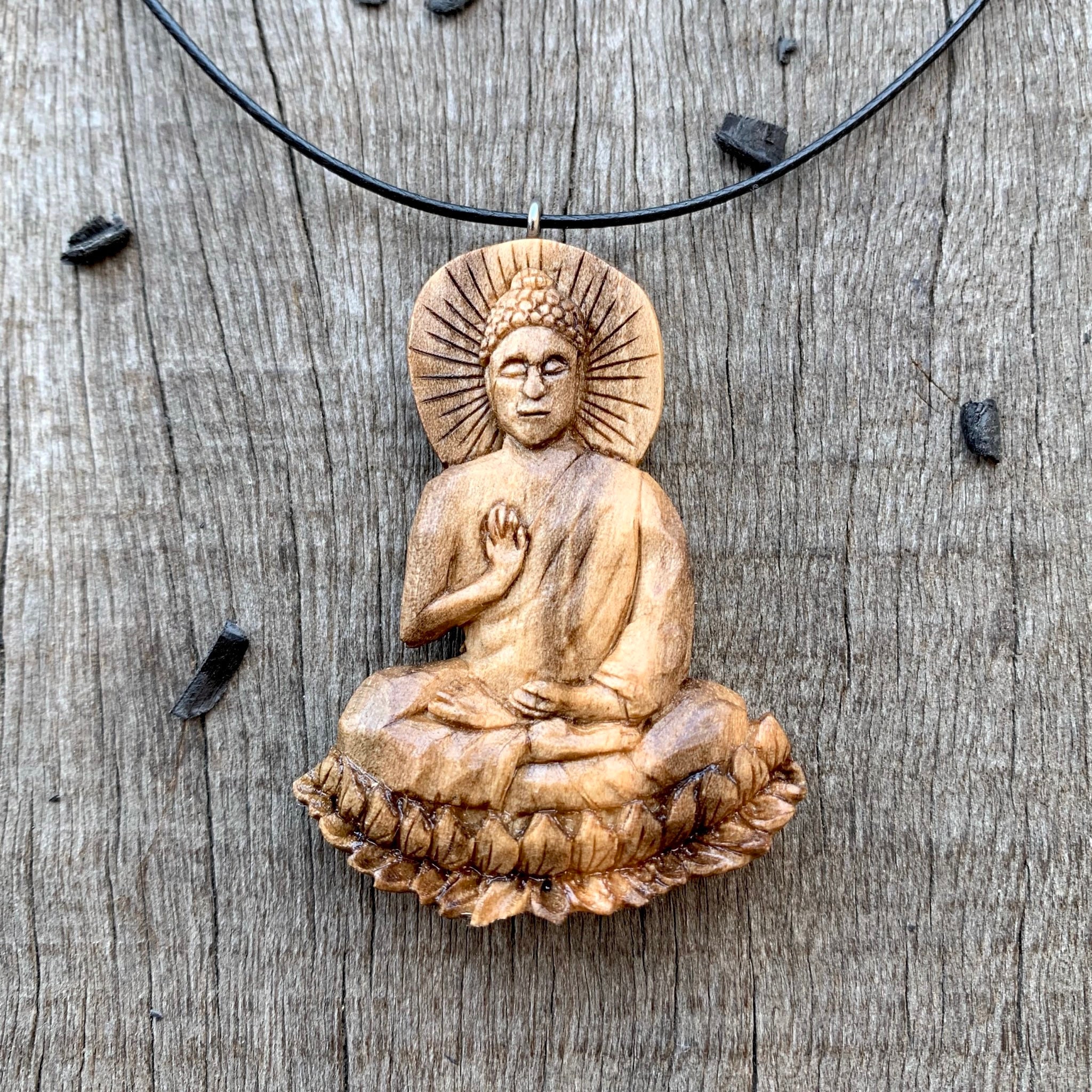 Carved buddha best sale pendant