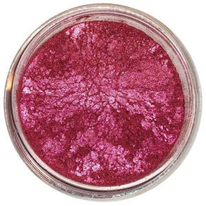 May include: A small jar of pink iridescent mica powder. The powder is shimmery and has a fine texture.