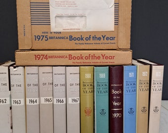 14 Encyclopedia Britannica Books Of The Year with original dust covers