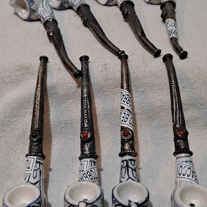 Collection of 8 hand made asian porcelain tobacco pipes