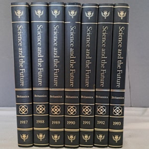 Collection of 7 volumes of the scarce cobalt blue Science And The Future from the Encyclopedia Britannica publishers