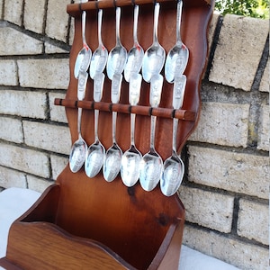 Collection of 12 International Silver Bicentennial Spoons with original display