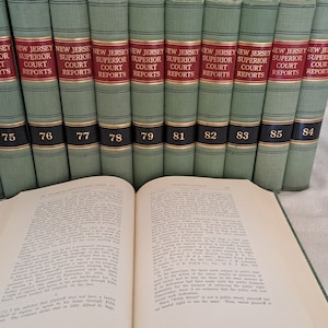 May include: A set of 11 green hardcover books with gold lettering and black accents. The books are titled "New Jersey Superior Court Reports" and are numbered 74 through 84.