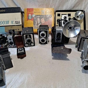 Collection of antique photo and movie  cameras