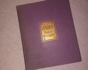 Rare 1911 first edition first print of "Verses Of Dolf Wyllarde" .