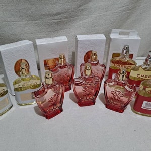 Collection of 14 Creed Perfume display factice bottles