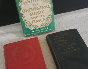 3 libros antiguos con temática de música clásica