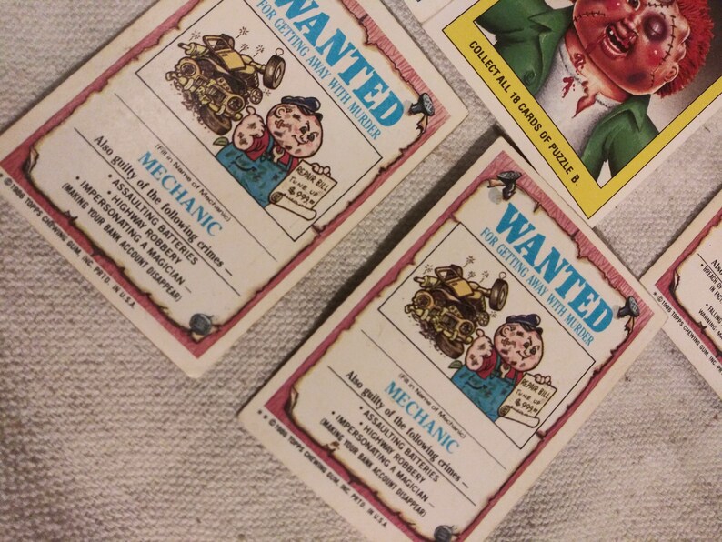 Collection of 40 second edition garbage pail kids with A and B alternat names.
