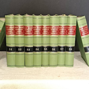 May include: A set of ten green hardcover books with gold lettering. The books are labeled "New Jersey Superior Court Reports" and numbered 50 through 59.