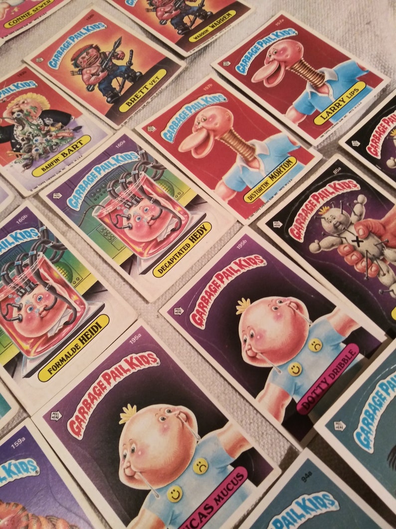 Collection of 40 second edition garbage pail kids with A and B alternat names.