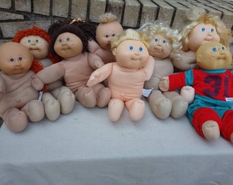 Kollektion von 8 vintage Xavier Roberts Cabbage Patch Puppen
