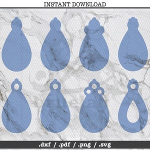 May include: Eight different earring designs in a light blue color. The designs include teardrop shapes, a teardrop with a small circle at the top, and a teardrop with three small circles at the top. The earrings are shown on a white marble background.
