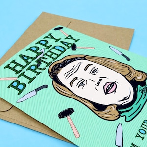 May include: A light green birthday greeting card featuring a cartoon illustration of a person with brown hair, surrounded by small drawings of hammers and knives. The text reads "HAPPY BIRTHDAY" and "FROM YOUR NUMBER ONE FAN".