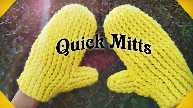 May include: A pair of bright yellow knitted mittens, with the text "Quick Mitts" in black lettering.